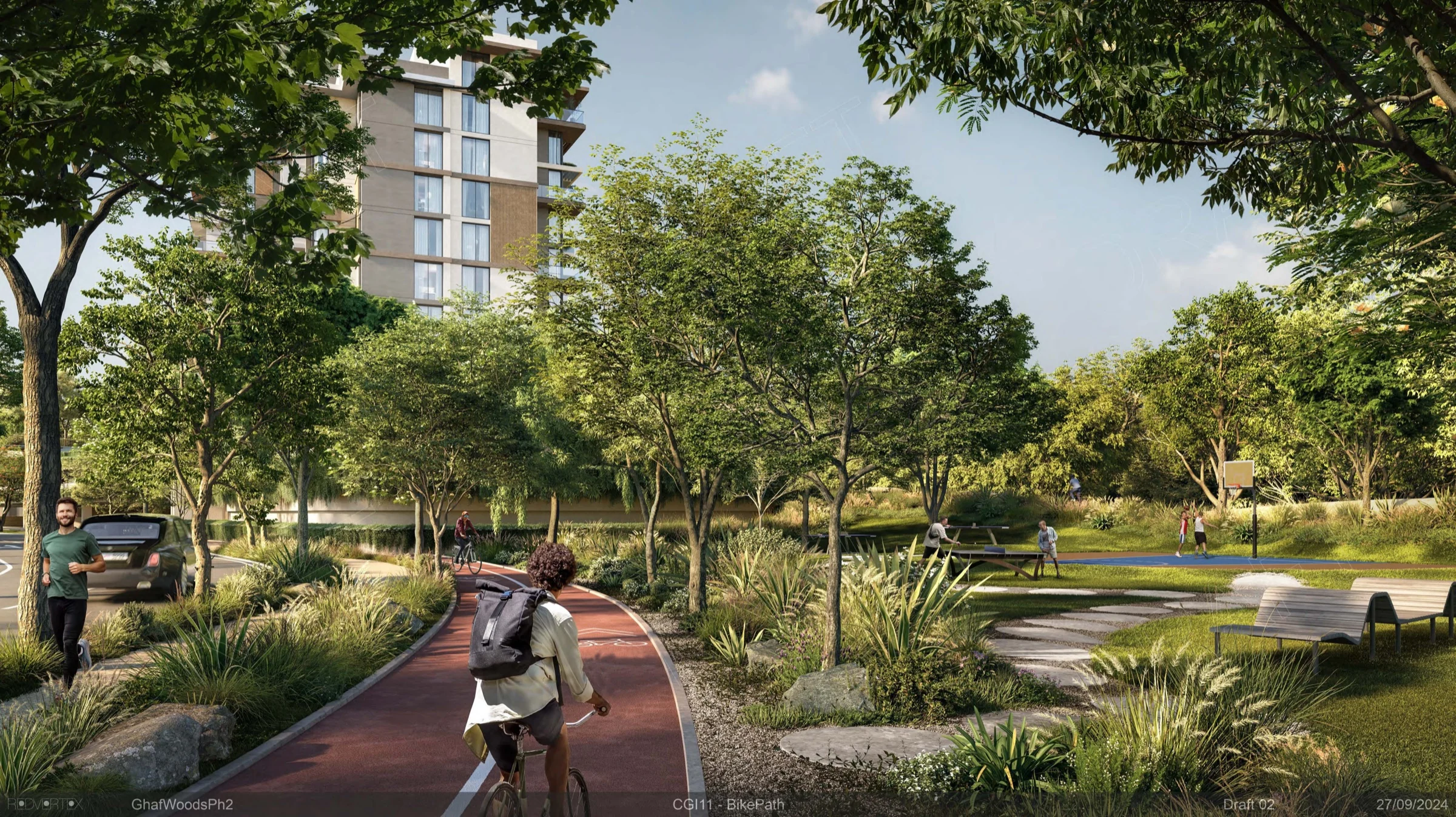 Ghaf Woods cycling path beside planted recreation spaces and a basketball court